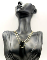 Biya Accessoires 18K gold plated layered celestial necklace with crystal stars.