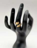 Hypoallergenic non-tarnish high polish sculptural feather ring UAE.
