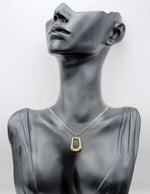 Waterproof gold hollow rectangle necklace on snake chain by Biya Accessoires.