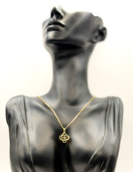18K gold plated kinetic orbit dancing stone necklace by Biya Accessoires.