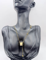 Designer style gold and crystal barrel necklace in luxury gift box.