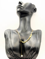 Biya Accessoires 18K gold plated asymmetrical interlocking circles pearl lariat necklace.