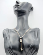 Close-up of premium hypoallergenic imitation jewelry featuring a crystal teardrop charm.