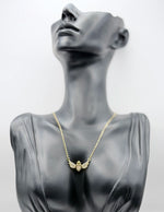 Waterproof gold heart pendant with crystal wings and crown Dubai.