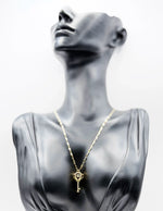 Waterproof gold key necklace with kinetic moving crystal Dubai.