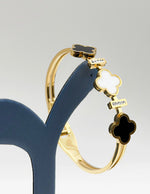 Hypoallergenic non-tarnish high polish gold hinge clasp bangle UAE.
