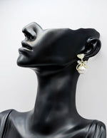 Everyday luxury jewelry uae coquette earrings by the best jewelry shop in UAE.