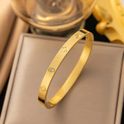Modern luxury fine art editorial jewelry engraved flower bracelet gift for her.