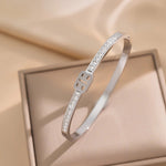 Modern luxury fine art editorial silver jewelry designer inspired signature bracelet gift for her.