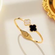 Modern luxury fine art editorial jewelry heritage bypass clover gift for her.