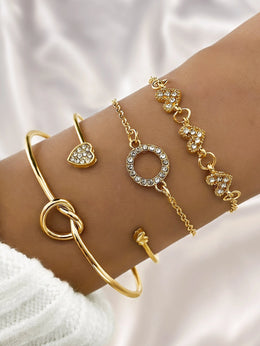 Waterproof 18K gold luxury heart and infinity bracelet stack Biya Accessoires UAE.