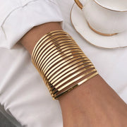 Waterproof 18K gold multi band wide corset cuff bracelet Biya Accessoires UAE.