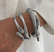 Waterproof silver chunky liquid metal cuff bracelet Biya Accessoires UAE.