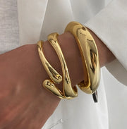 Waterproof 18K gold chunky liquid metal cuff bracelet Biya Accessoires UAE.