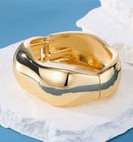 Waterproof 18K gold chunky hinged cuff bracelet Biya Accessoires UAE.