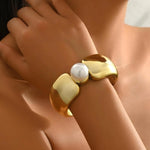 Luxury tarnish-free stainless steel sculptural pearl gold jewelry for sensitive skin.