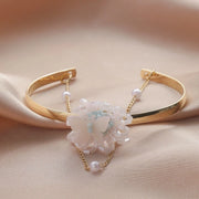 Waterproof 18K gold layered pearl and butterfly bangle Biya Accessoires UAE.