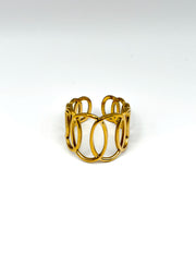 Gold ring with a modern design on a white background