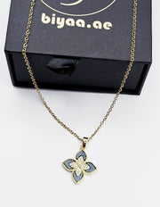 18K gold plated black quatrefoil clover pendant necklace by Biya Accessoires.