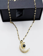 Waterproof gold moon pendant with hidden message in 100 languages Dubai.