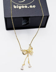 Waterproof gold ribbon necklace with teardrop crystals Dubai.