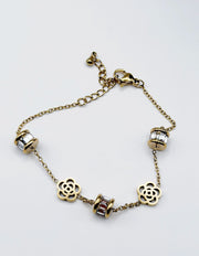 Modern luxury fine art editorial jewelry delicate gold chain bracelet gift for her.