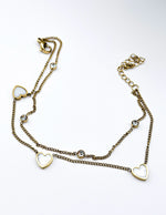 18K gold plated double chain pearlescent heart bracelet by Biya Accessoires.