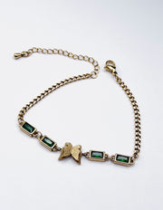 Hypoallergenic non-tarnish high polish gold green crystal station bangle UAE.