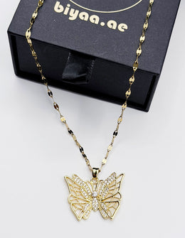 Hypoallergenic non-tarnish gold statement insect necklace.