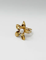 18K gold plated oversized pearl floral statement ring by Biya Accessoires.