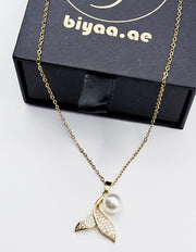 18K gold plated pearl and crystal mermaid tail pendant in luxury gift box.