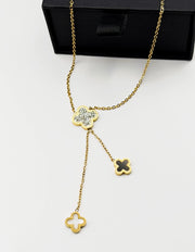 18K gold plated triple clover lariat necklace by Biya Accessoires.
