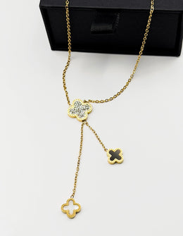 18K gold plated triple clover lariat necklace by Biya Accessoires.