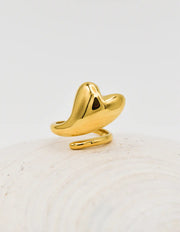 Gold pinky ring with abstract heart-shaped drop on shell