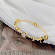 Model wearing premium hypoallergenic imitation jewelry bracelet in Dubai.