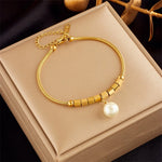Hypoallergenic non-tarnish high polish gold pearl bangle UAE.