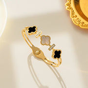 Modern luxury fine art editorial jewelry heritage clover bangle gift for her.