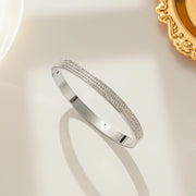 Modern luxury fine art editorial silver jewelry three row pave bracelet gift for her.
