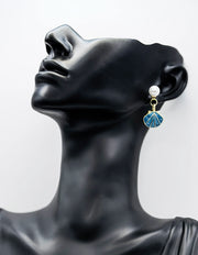 Everyday luxury fashion jewelry gold tone statement drops by Biya Accessoires Dubai.