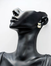 Best fashion jewelry in UAE bow-shaped crystal earrings for women.