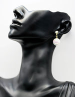 Everyday luxury fashion jewelry gold tone statement drops by Biya Accessoires Dubai.