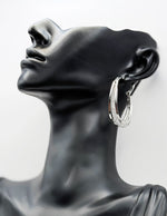 Best fashion jewelry in UAE silver hoops with S925 silver needles.