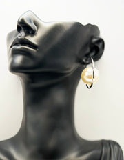 Close-up of premium hypoallergenic imitation jewelry featuring a large pearl design.