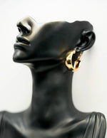 Best fashion jewelry in UAE thick gold statement hoops for women.