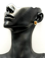 Everyday luxury fashion jewelry gold tone statement studs by Biya Accessoires Dubai.