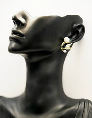 Best imitation jewellery brands in uae crystal leaf and pearl drop earrings.