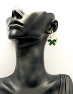 Best imitation jewellery brands in uae gold butterfly dangles with green crystals.
