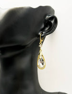 Biya Accessoires artificial jewellery online dubai clear crystal teardrop dangle earrings.