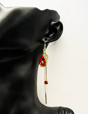 Best imitation jewellery brands in uae gold peacock dangles with Teal red teardrop stones.
