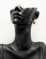 Best imitation jewellery brands in uae gold trapeze earrings with white enamel.